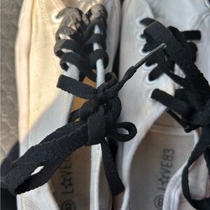 White Sneakers with Black Laces